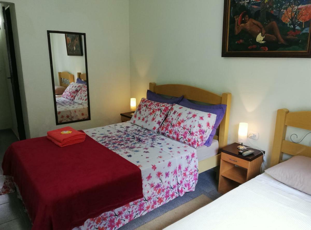 Quarto Triplo com Vista do Jardim
